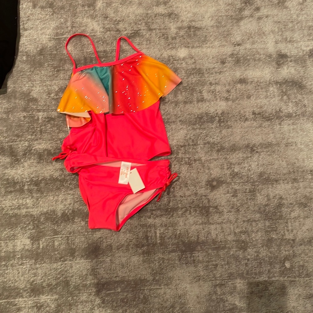 BRAND NEW NEVER WORN SWIMSUIT FOR GIRLS SIZE 7-8